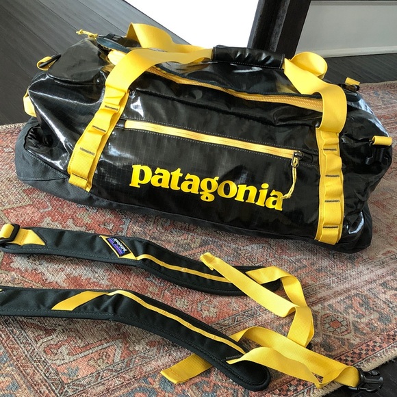 black hole duffel patagonia poshmark 40L Smolder Blue/Amanita Red stuffs into its own pocket for easy storage Padded Patagonia Black Hole 60L Duffel